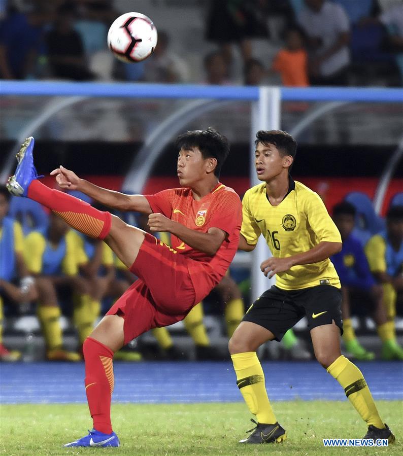 (SP)CHINA-HAIKOU-SOCCER-INTERNATIONAL YOUTH FOOTBALL TOURNAMENT-MALAYSIA VS CHINA (CN)